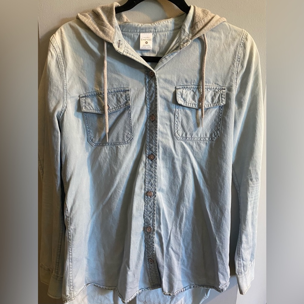 Thin, light-wash faux jean jacket. Gray sweatshirt-material hood. Medium size.